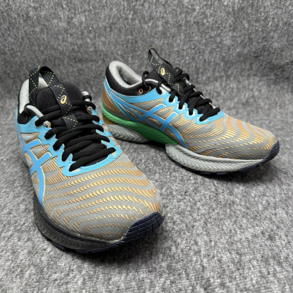 Asics FN1 S Gel Nimbus 22 Womens 9 Stone Grey Pure Gold 1202A129 Running Sneaker